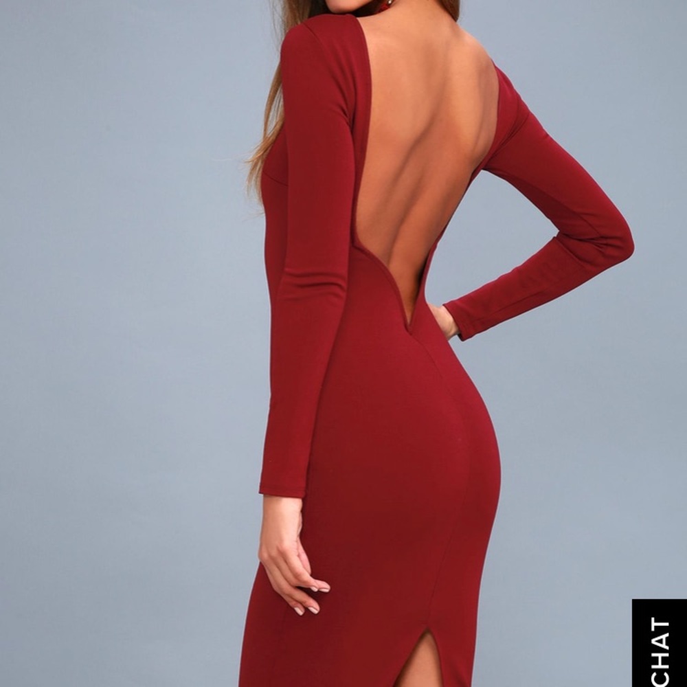 Red open back dress.